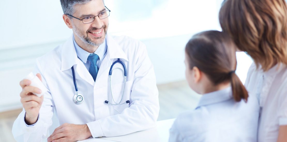 Functional Medicine Doctor Conducting Thrive Program Photo of functional medicine doctor helping patients in the Thrive Program