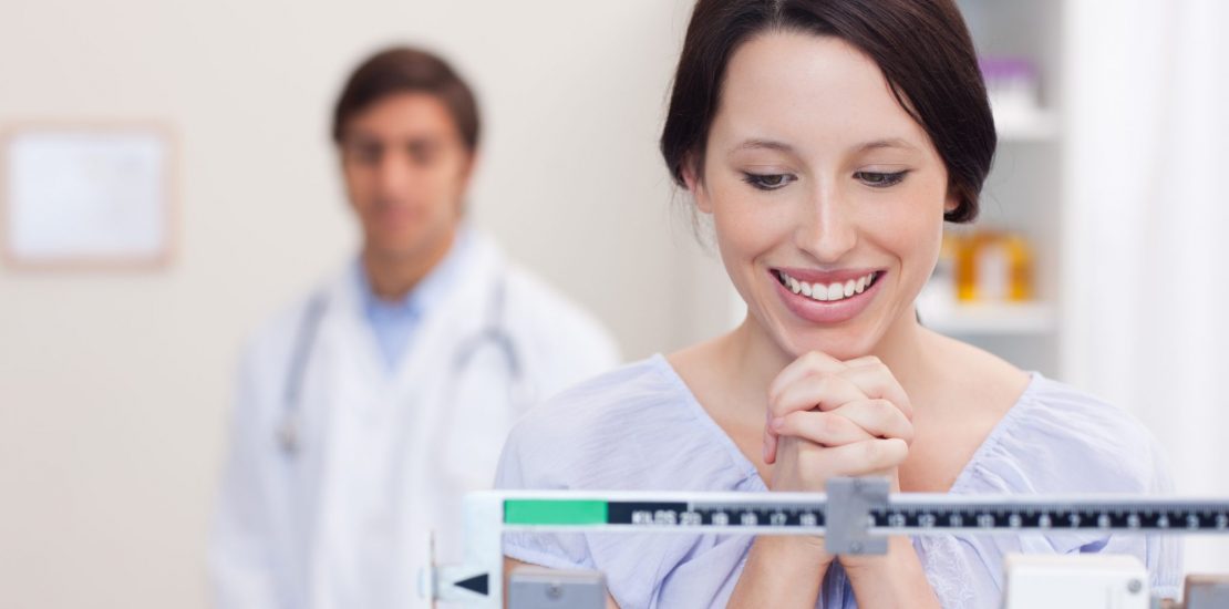 Woman happy to have addressed her PCOS and other hormonal imbalances and finally achieve her target weight Photo of Woman happy to have addressed her PCOS and other hormonal imbalances and finally achieve her target weight on Focus Integrative Healthcare's Hormone-Balancing and Fertility Program